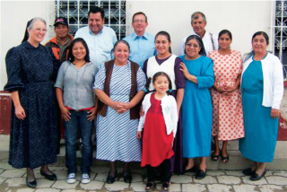 Ismael Quiñonez (center rear) and the church at San Andrés.