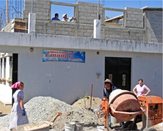 Muscles in action concrete was mixed in the street and relayed to the roof.