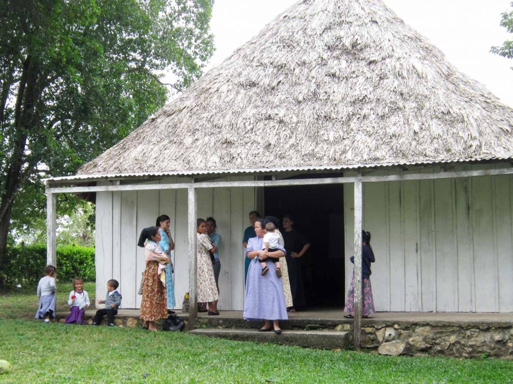 The thatch-roofed church building was built in 1998.