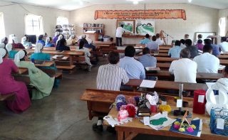 Pedro Tucubal is a painter, here teaching art at the Teachers Institute