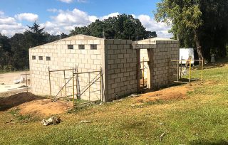 The new restroom facilities stand directly behind the institute facility.